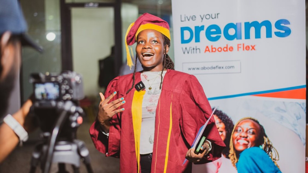 Graduate speaking at Abode Associates event