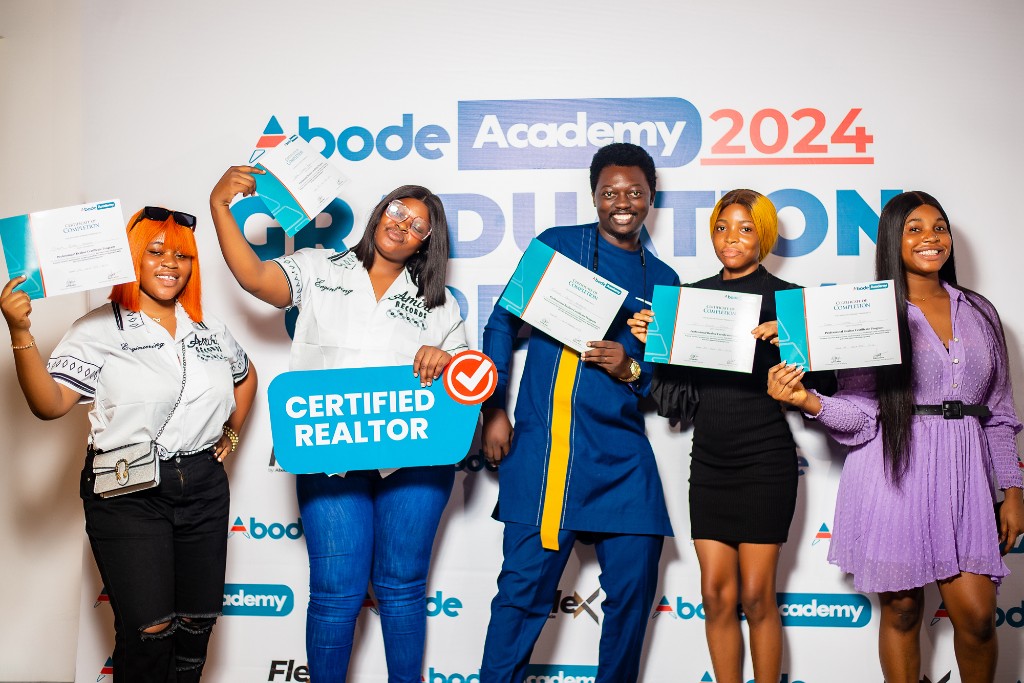 Group of graduates with certificates